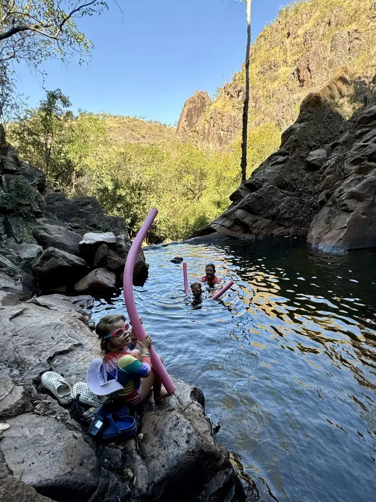 Swimming in a waterfall because we have time now we're FIRE'd